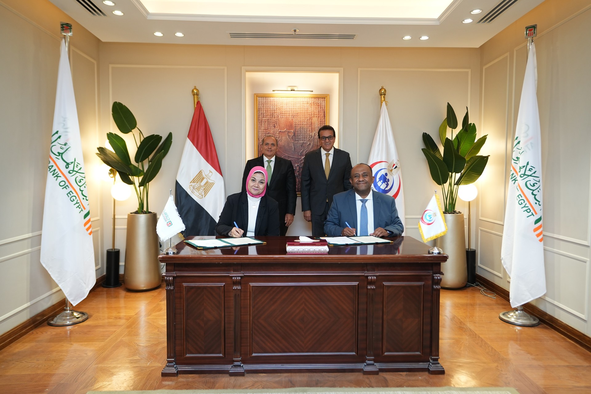 البنك الأهلي المصري يوقع بروتوكولي تعاون مع وزارة الصحة والسكان لدعم منظومة القطاع الصحي في مصر