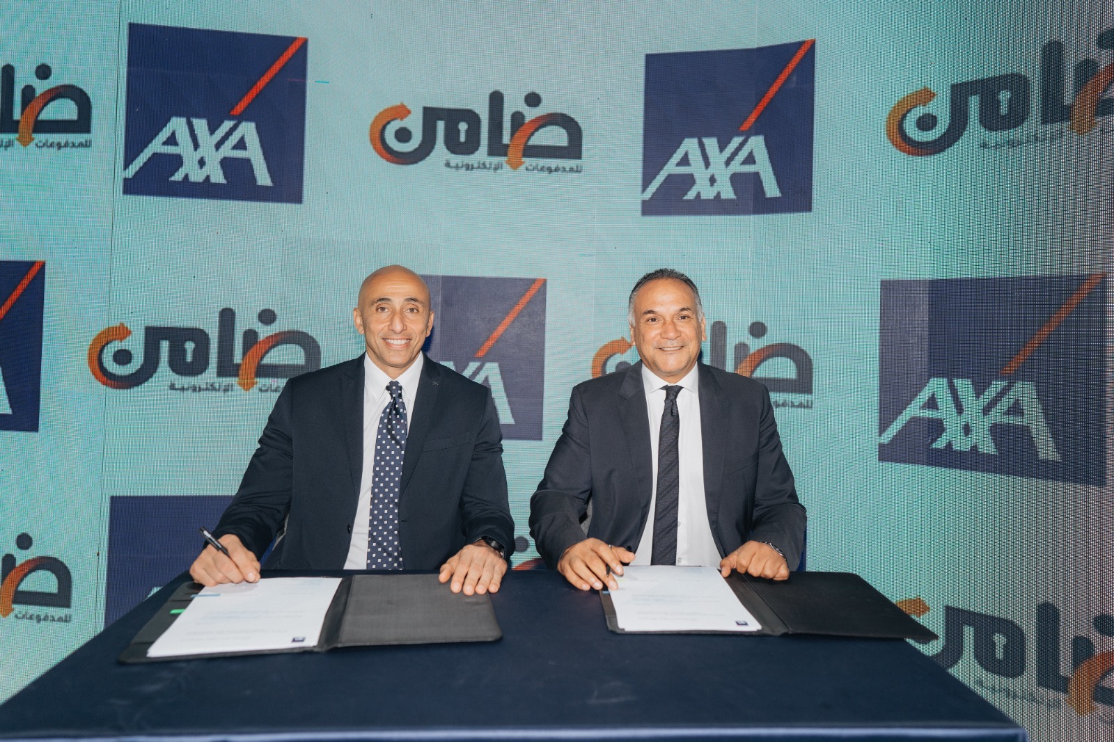 «ضامن للمدفوعات الإلكترونية» توقع عقدًا مع «أكسا لتأمينات الحياة» لدعم أكثر من 120 ألف تاجر في محافظات مصر